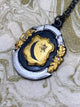 FLORAL SHEILD NECK