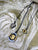 FLORAL SHEILD NECK