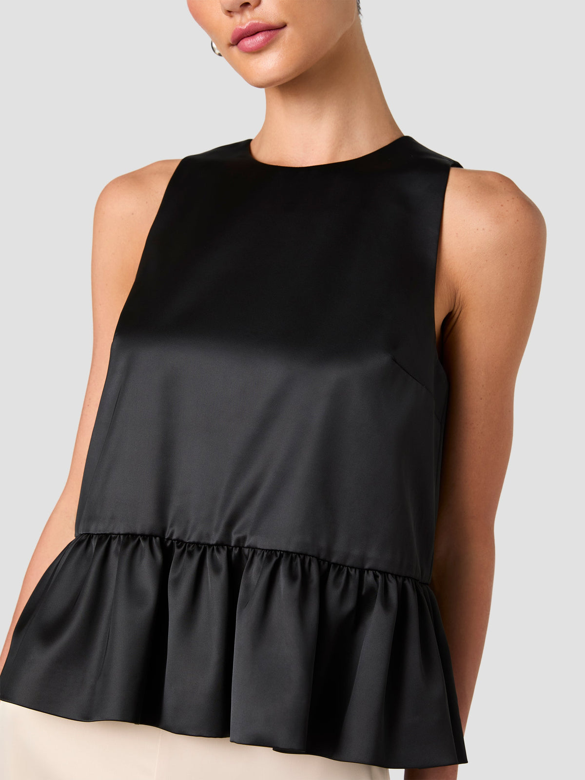 CAREY SATIN SLEEVELESS PEPLUM TOP