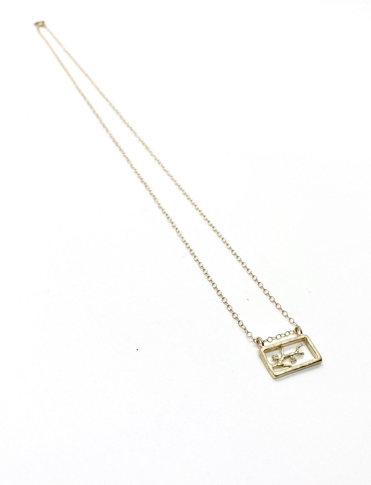 OPEN RECTANGLE BLOSSOM NECKLACE